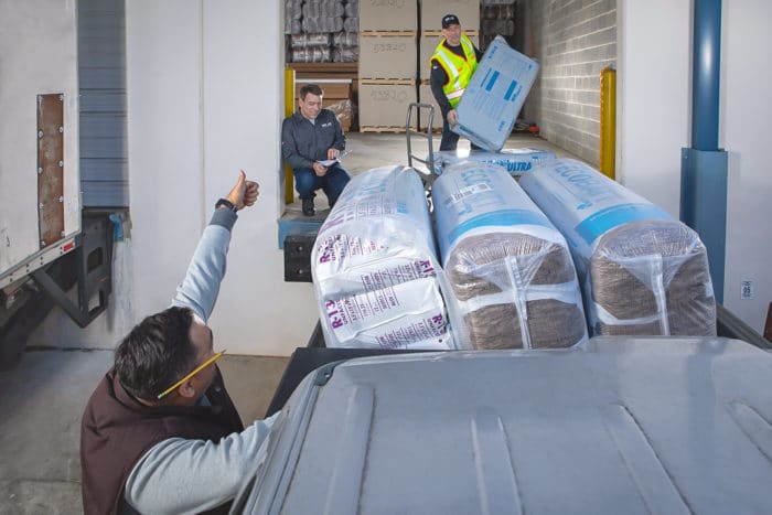 SP Employees Delivering Insulation